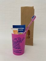 Junior-Zahnpflegebeutel pink mit Zahnbürste Modell E im Papierbeutel
