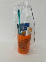 Junior-Zahnpflegebeutel orange mit Zahnbürste Modell E im Kordelzugbeutel